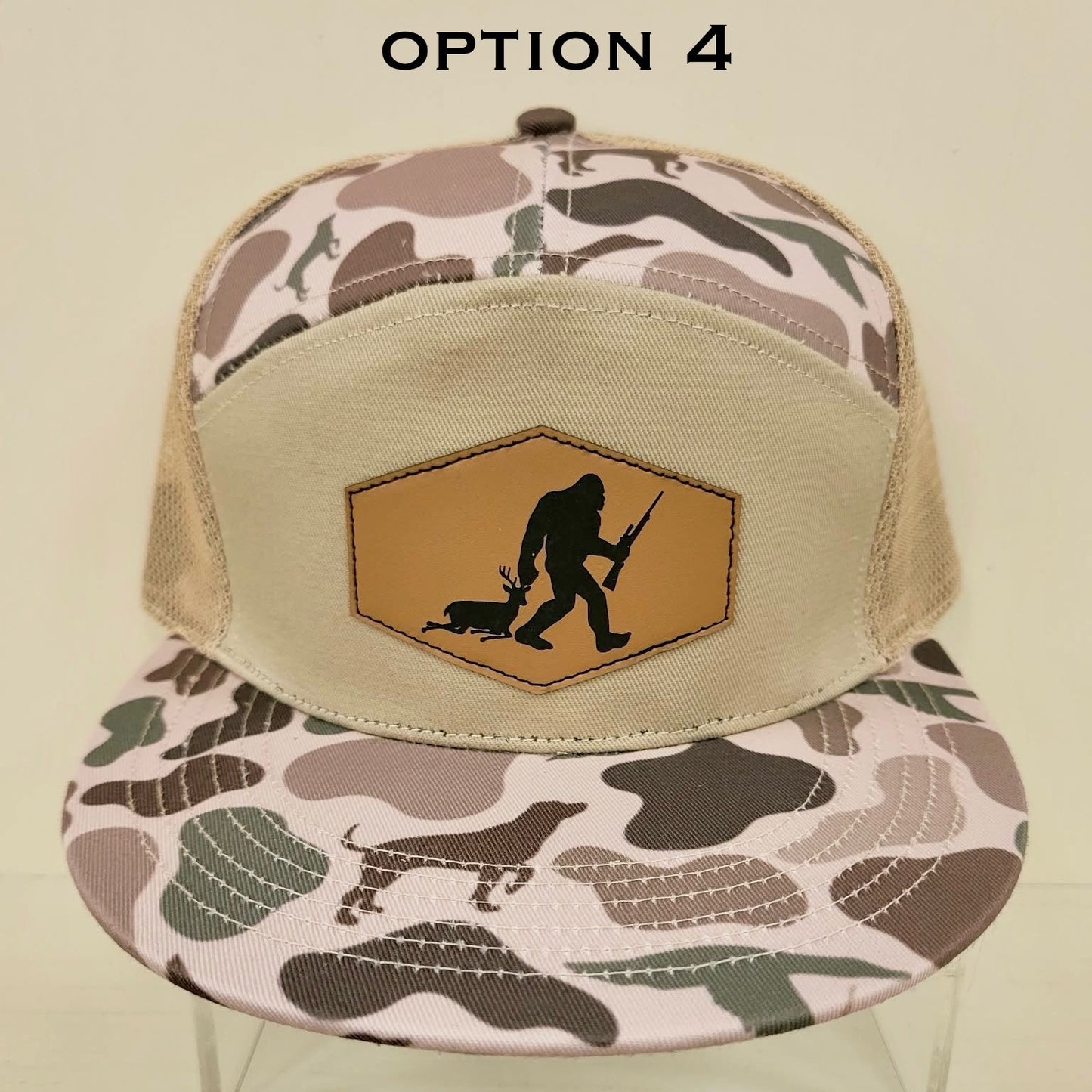 Camouflage-patterned cap with a logo on a beige background